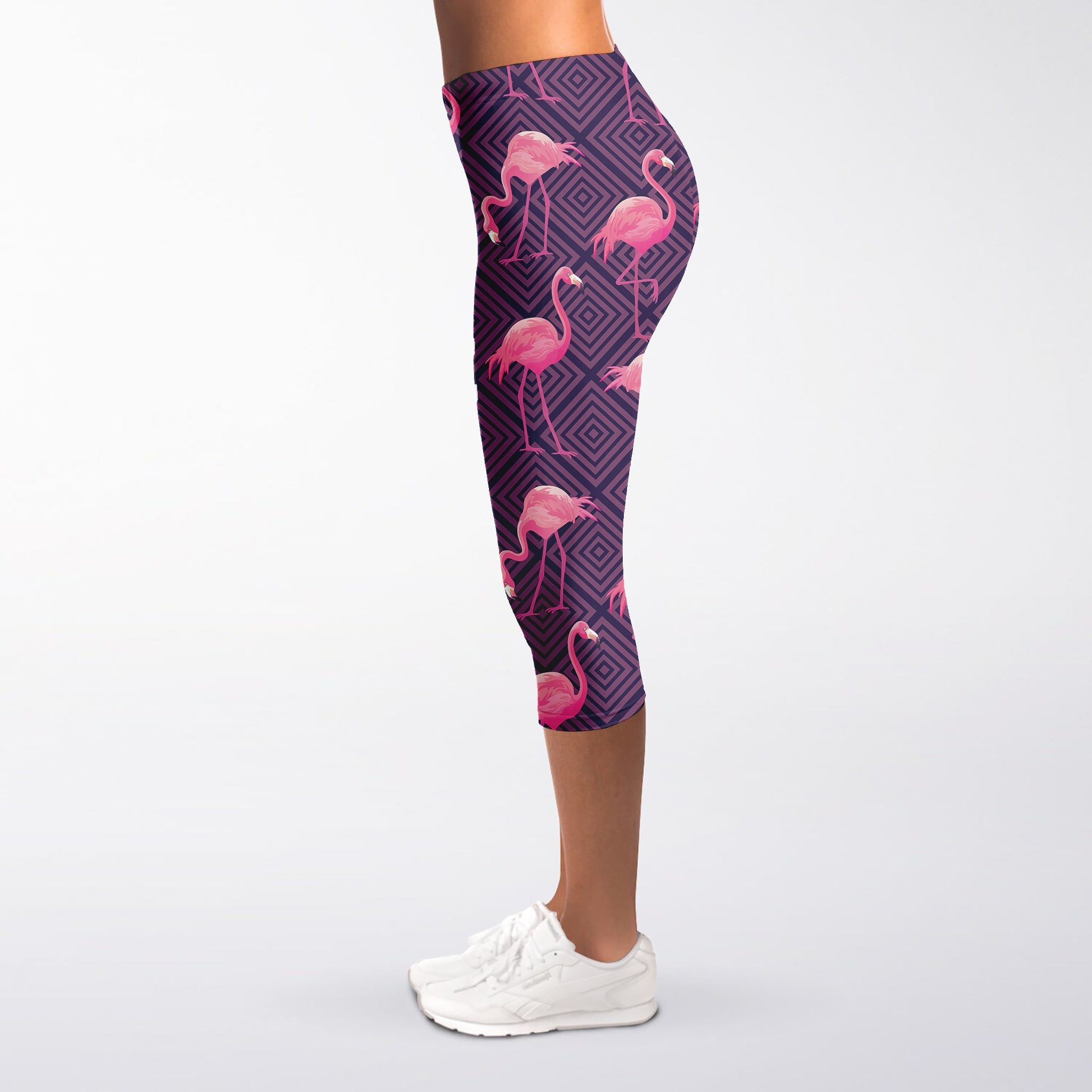 https://loveminegifts.com/cdn/shop/products/purple-geometric-flamingo-pattern-print-womens-capri-leggings-03_1024x1024@2x.jpg?v=1679744852