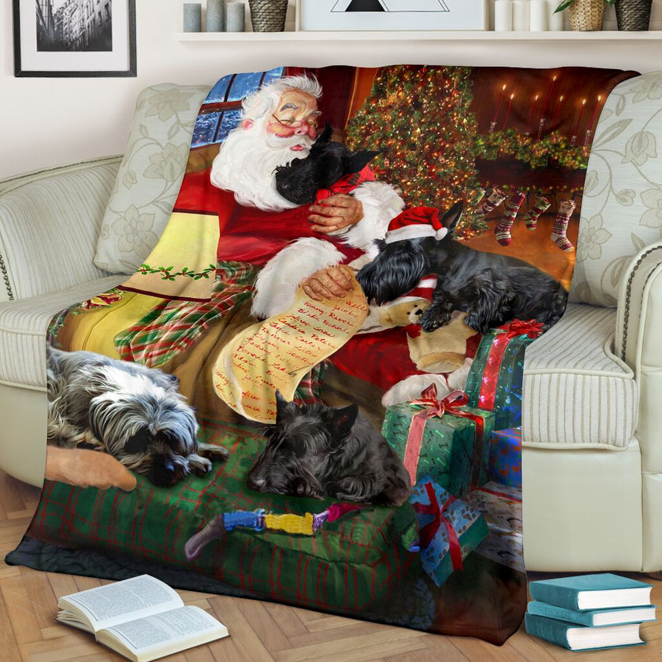 Scottish dog sleep with santa claus blanket